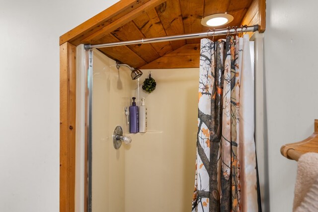 127 Berry Reister Dr, Blairsville, GA 30512 - bathroom featuring a shower with shower curtain, lofted ceiling, and wood ceiling