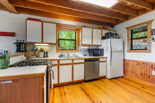 127 Berry Reister Dr, Blairsville, GA 30512 - kitchen featuring stainless steel appliances, a sink, wood ceiling, white cabinetry, and beam ceiling