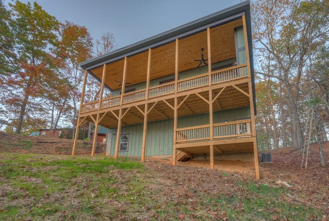 back of property with a deck