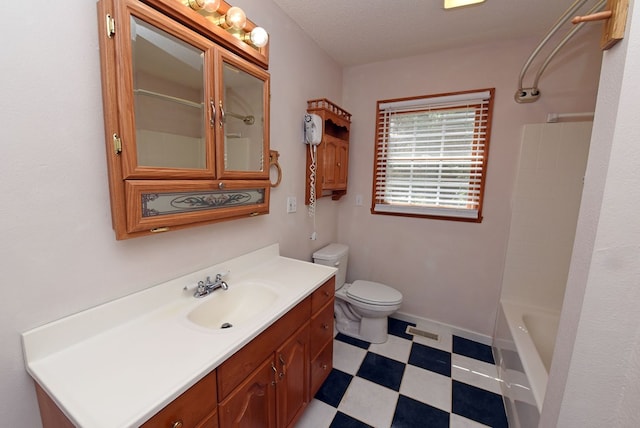 full bathroom featuring shower / bathing tub combination, vanity, toilet, and a textured ceiling