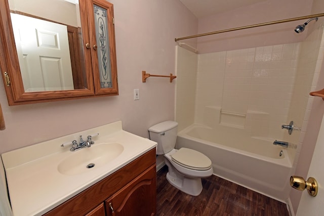 full bathroom with hardwood / wood-style flooring, vanity, toilet, and bathing tub / shower combination