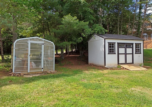 view of outdoor structure with a yard