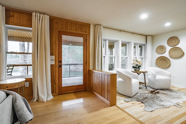 doorway with light hardwood / wood-style floors