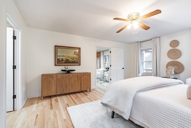 bedroom featuring ceiling fan and light hardwood / wood-style floors