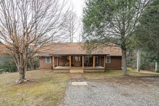 ranch-style house with covered porch