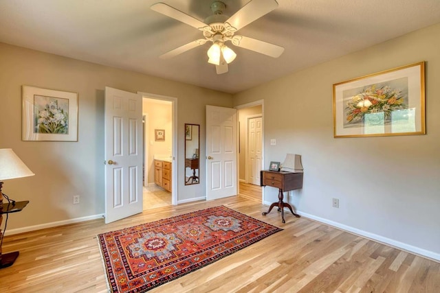 miscellaneous room featuring light hardwood / wood-style floors and ceiling fan