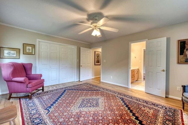 living area with light wood-type flooring, ceiling fan, and crown molding