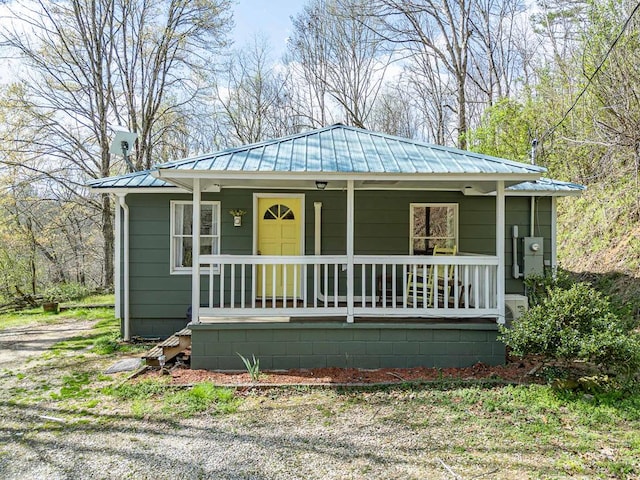 211 Gregory Hollow Rd, Robbinsville, NC 28771 - bungalow-style home with a porch and metal roof