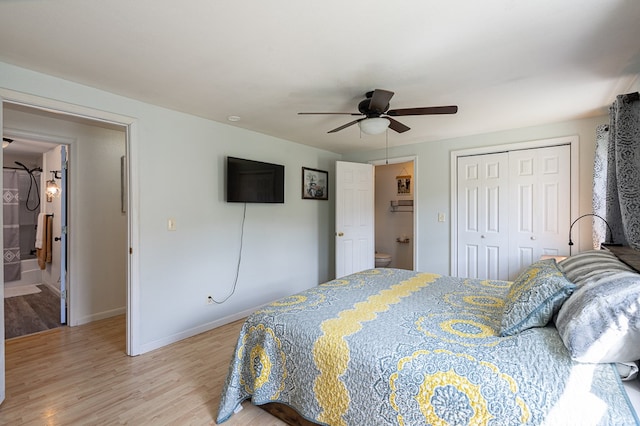 211 Gregory Hollow Rd, Robbinsville, NC 28771 - bedroom with light wood-style floors, ensuite bathroom, a closet, a ceiling fan, and baseboards