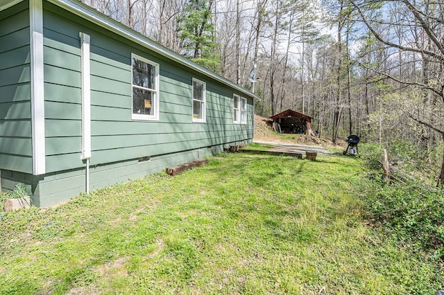211 Gregory Hollow Rd, Robbinsville, NC 28771 - view of side of home featuring a yard and crawl space