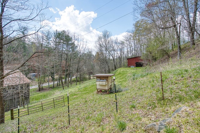 211 Gregory Hollow Rd, Robbinsville, NC 28771 - view of yard with a wooded view, fence, and an outdoor structure