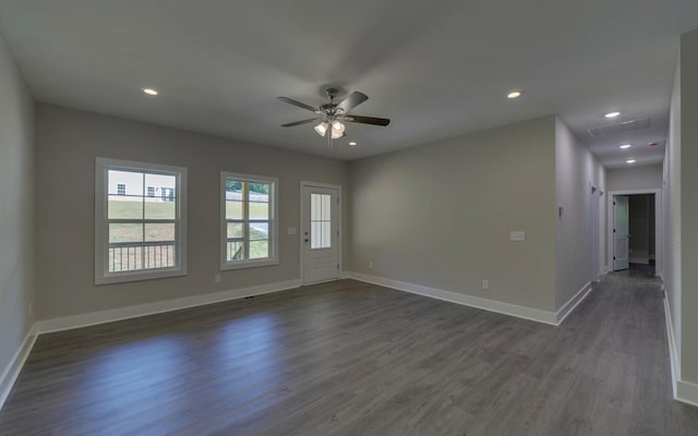 unfurnished room with recessed lighting, dark wood finished floors, baseboards, and ceiling fan