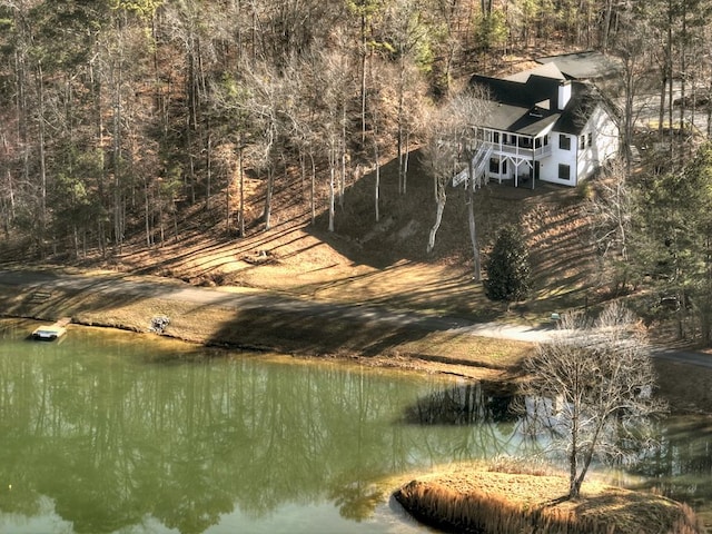 view of water feature with a wooded view