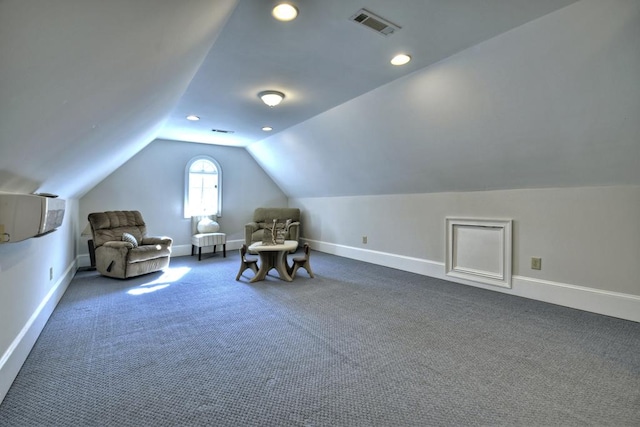 living area featuring visible vents, recessed lighting, dark colored carpet, baseboards, and vaulted ceiling