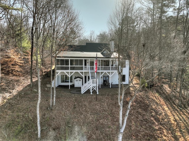 view of front of property with stairs