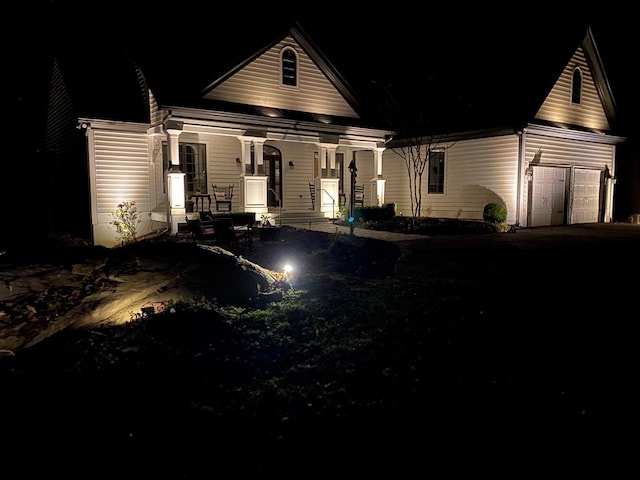 view of front of house featuring an attached garage and driveway