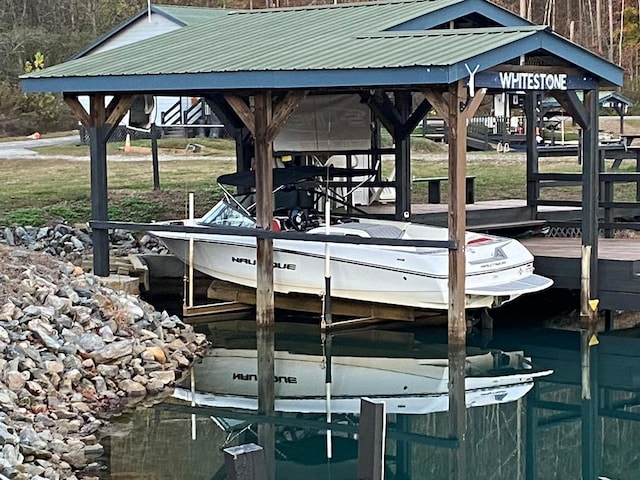 view of dock with boat lift