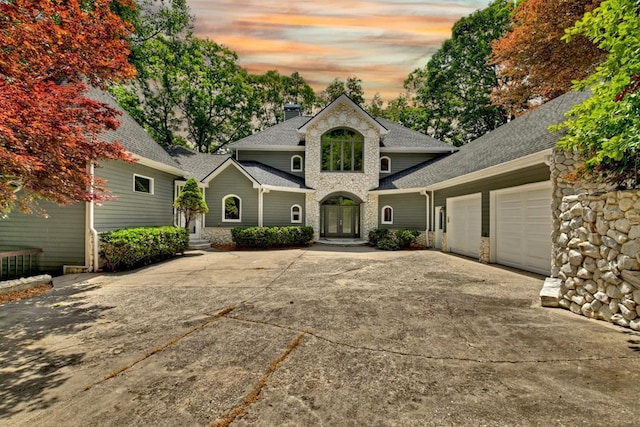 view of front of home with a garage