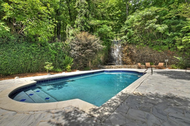 view of pool with a patio area