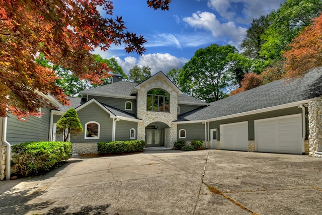 view of front of property with a garage