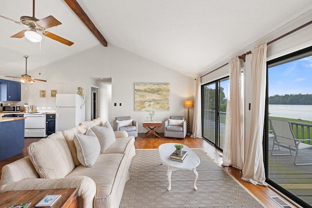 2793 Hidden Valley Rd, Hiawassee, GA 30546 - living area featuring dark wood-style flooring and ceiling fan