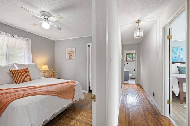 2793 Hidden Valley Rd, Hiawassee, GA 30546 - bedroom featuring a textured ceiling and wood-type flooring