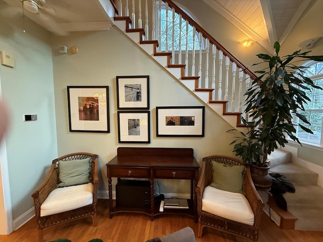 sitting room with a healthy amount of sunlight and hardwood / wood-style floors