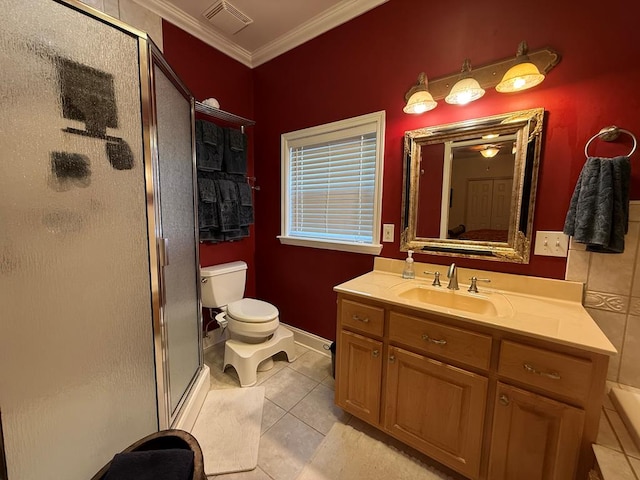 bathroom with toilet, a shower with door, tile patterned floors, crown molding, and vanity