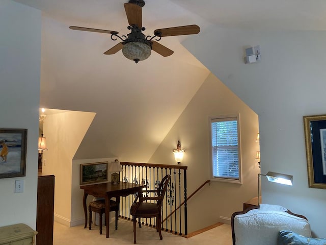 interior space featuring vaulted ceiling, ceiling fan, and carpet floors