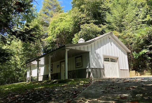 view of outbuilding with a garage