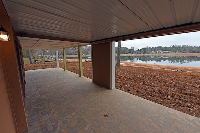 view of patio / terrace with a water view