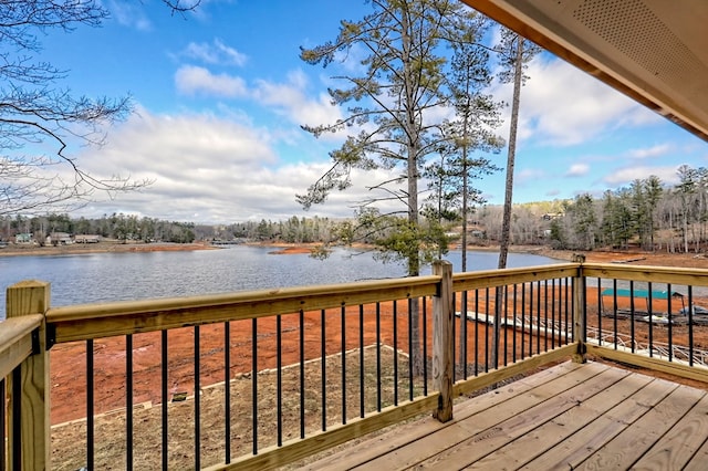 wooden terrace with a water view