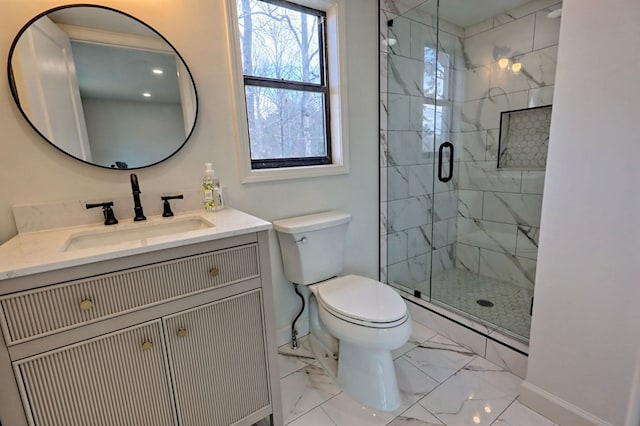 full bath with toilet, vanity, baseboards, marble finish floor, and a shower stall