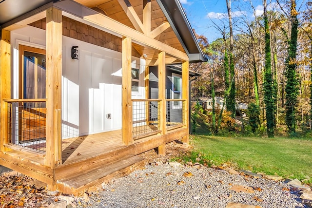 view of side of property with a lawn