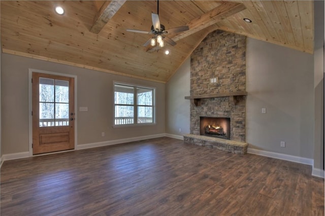 unfurnished living room featuring beamed ceiling, dark wood-type flooring, a fireplace, and wood ceiling