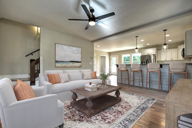 living area featuring ceiling fan, dark wood finished floors, and recessed lighting