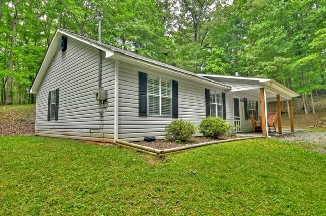 151 Padget Ln, Ellijay, GA 30540 - view of side of property featuring a yard and covered porch