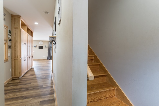 hallway featuring dark hardwood / wood-style floors