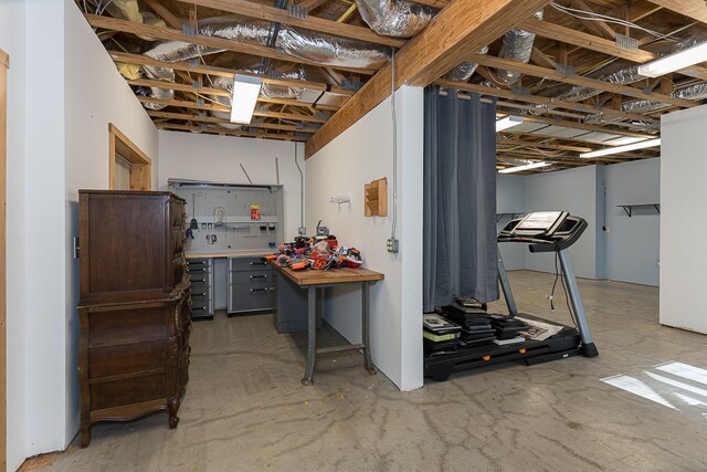 basement with a workshop area