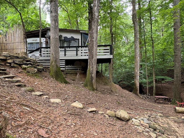 rear view of house with a deck