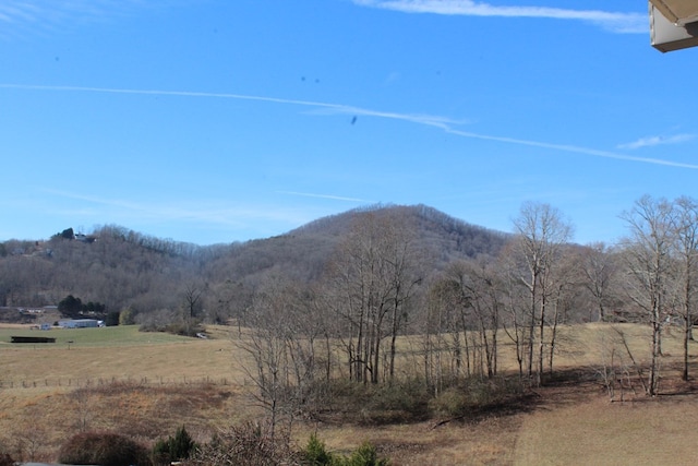 property view of mountains featuring a rural view