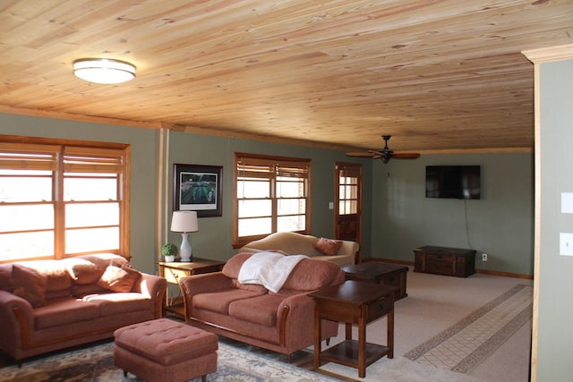 carpeted living room featuring ornamental molding, wooden ceiling, and ceiling fan