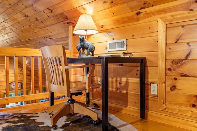 workout area featuring wood ceiling