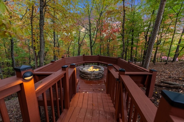 deck with an outdoor fire pit