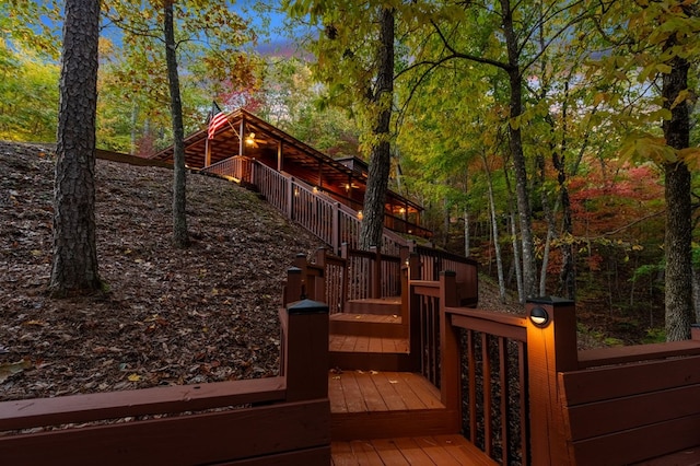 yard at dusk with a wooden deck