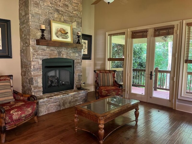 366 Licklog Rdg, Hayesville, NC 28904 - sitting room with wood finished floors, a stone fireplace, ceiling fan, healthy amount of natural light, and a towering ceiling