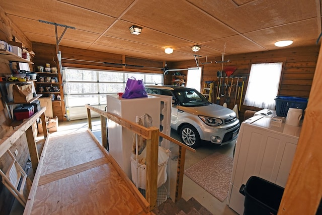 garage featuring independent washer and dryer