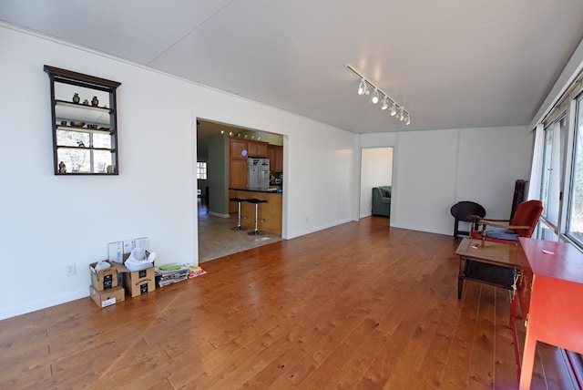 living area with hardwood / wood-style floors