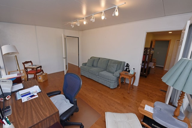 home office with wood-type flooring