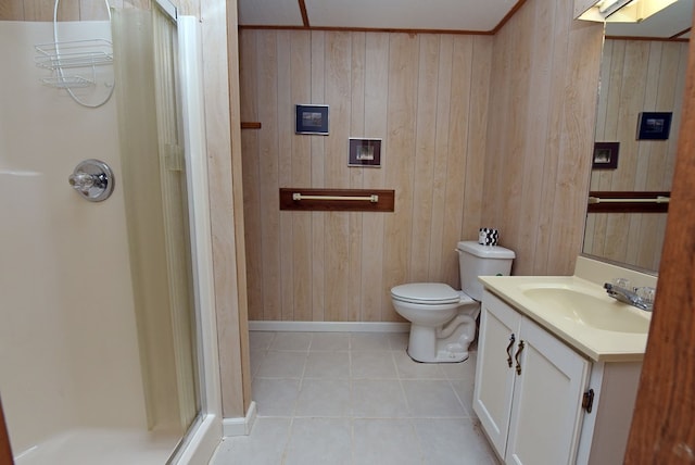 bathroom with wood walls, tile patterned flooring, vanity, walk in shower, and toilet